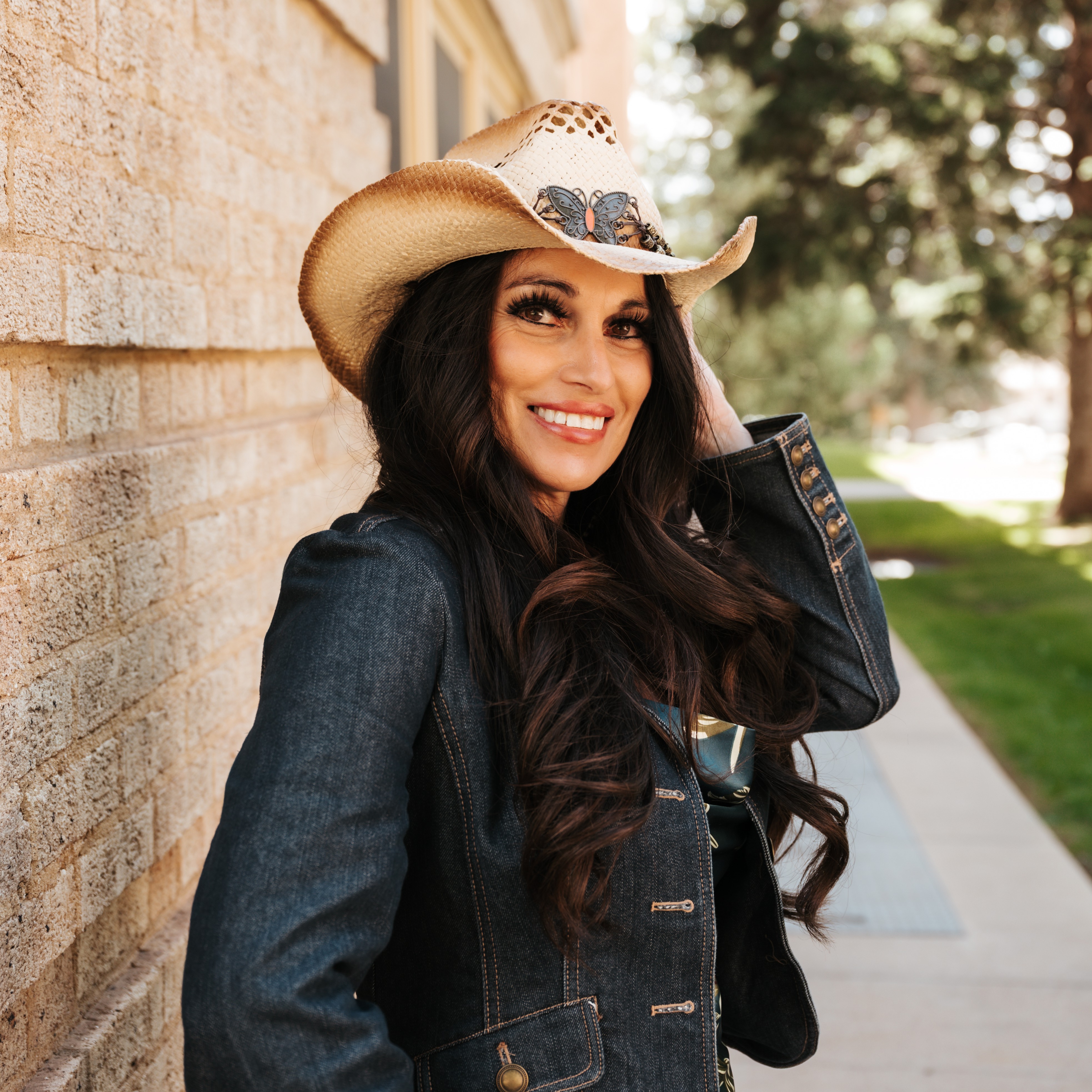 Merissa Martinez in a cowboy hat and denim jacket in Laramie, Wyoming
